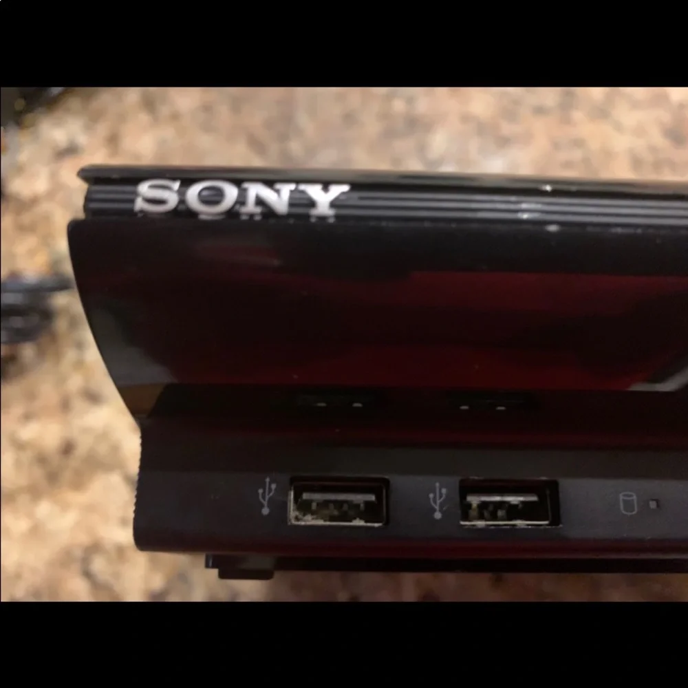 Sony PlayStation 3  Super Slim 250GB  Bundle, Model CECH 4001B + (7) Games